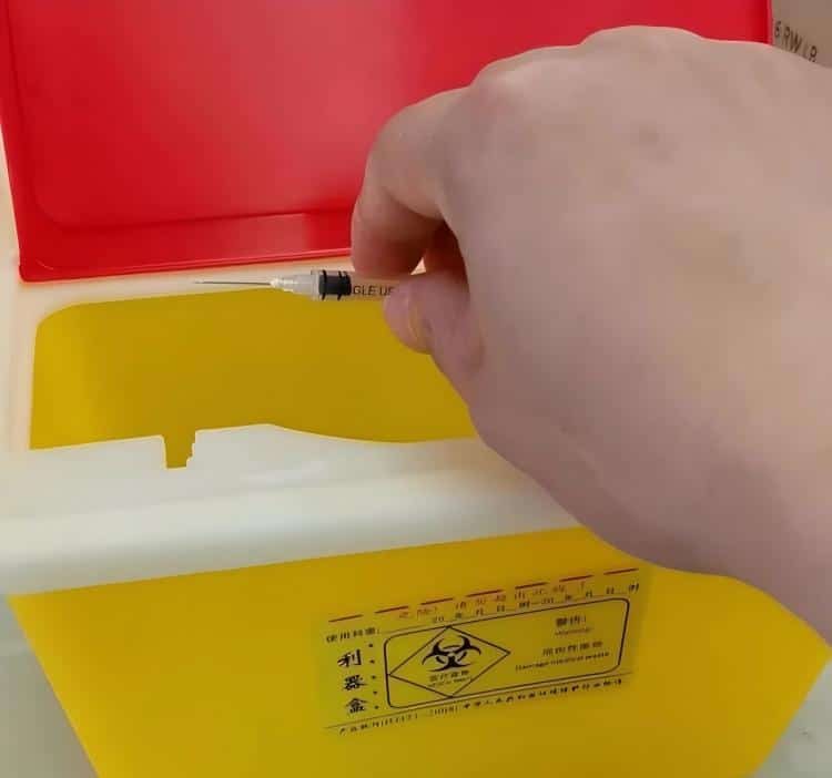 Proper-disposal-of-used-insulin-syringes-in-medical-waste-container