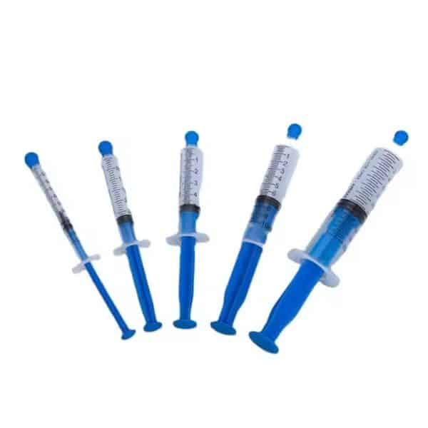 different size oral feeding syringe with tip cap