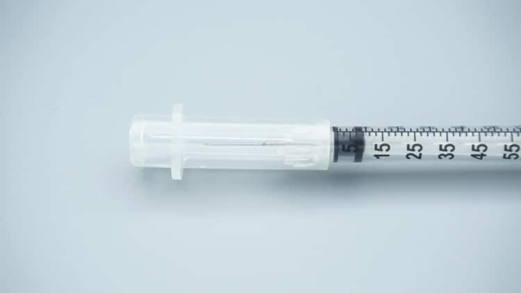 Healthcare-Worker-Using-Safety-Syringe-Patient-Care