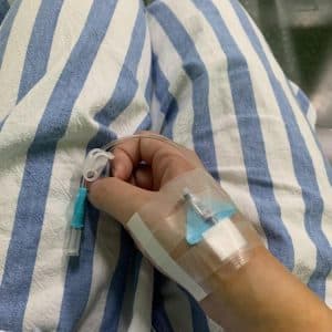nurse-inserting-peripheral-iv-catheter-sterile-technique-patient-safety-healthcare