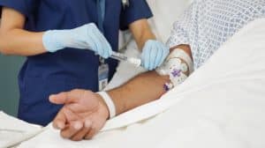 healthcare-worker-safely-administering-pre-filled-vaccine-syringe-patient-care-medical-injection