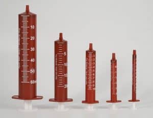 professional-healthcare-worker-preparing-chemotherapy-drugs-using-amber-colored-protective-syringes-hospital-setting