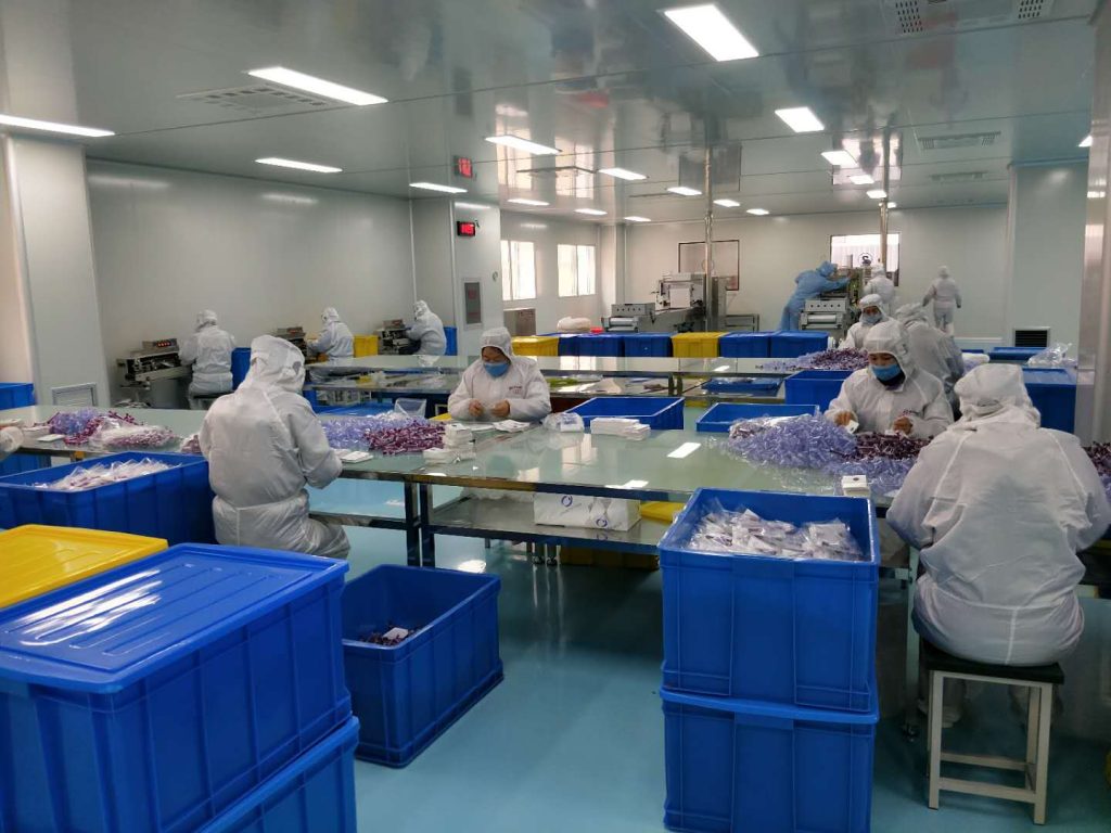 hypodermic needle production assembly line operation