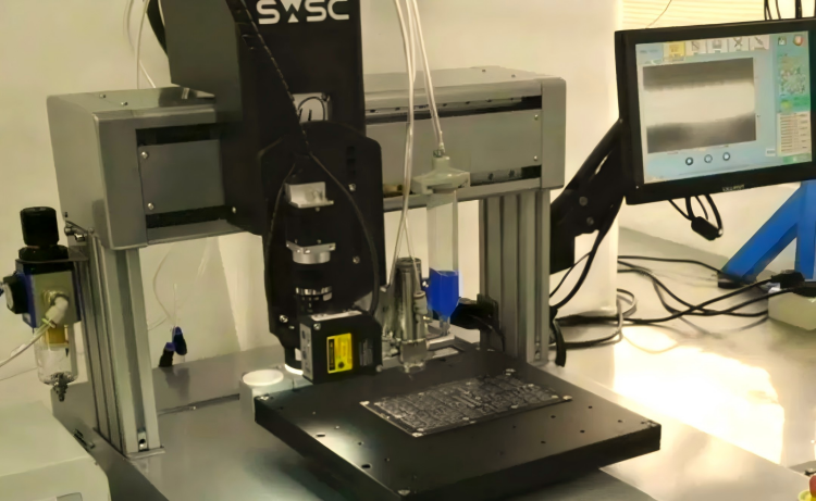 industrial-precision-dispensing-syringe-applying-adhesive-to-electronic-circuit-board