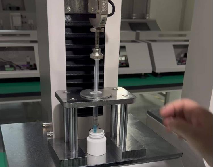 quality-control-inspector-testing-medical-syringe-precision-in-manufacturing-laboratory