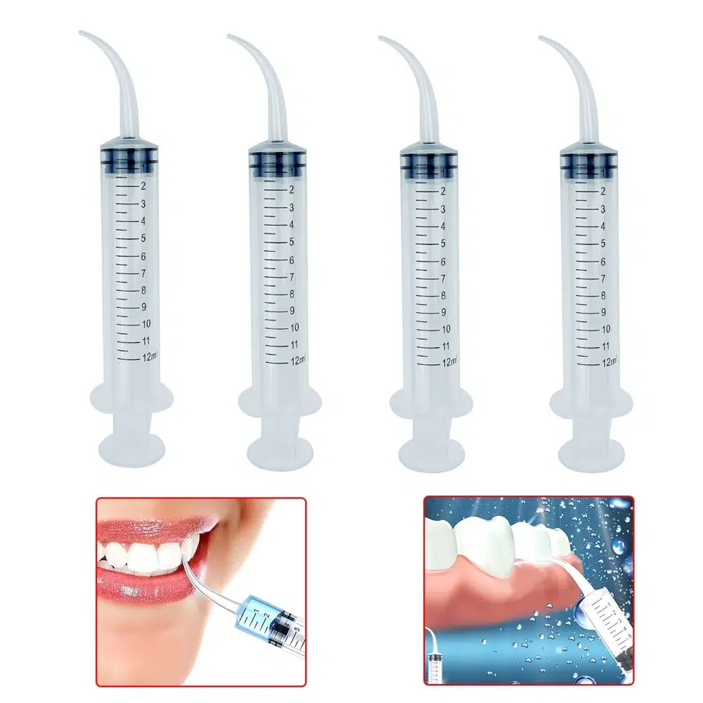 Bulk pack of 50 disposable dental syringes with clinical application scene from plastic syringes manufacturer Kohope
