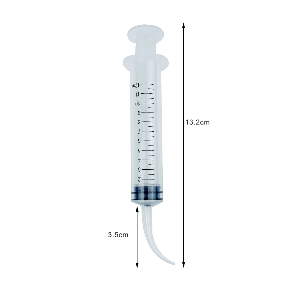 Close-up of dental irrigation syringe curved nozzle for precision delivery