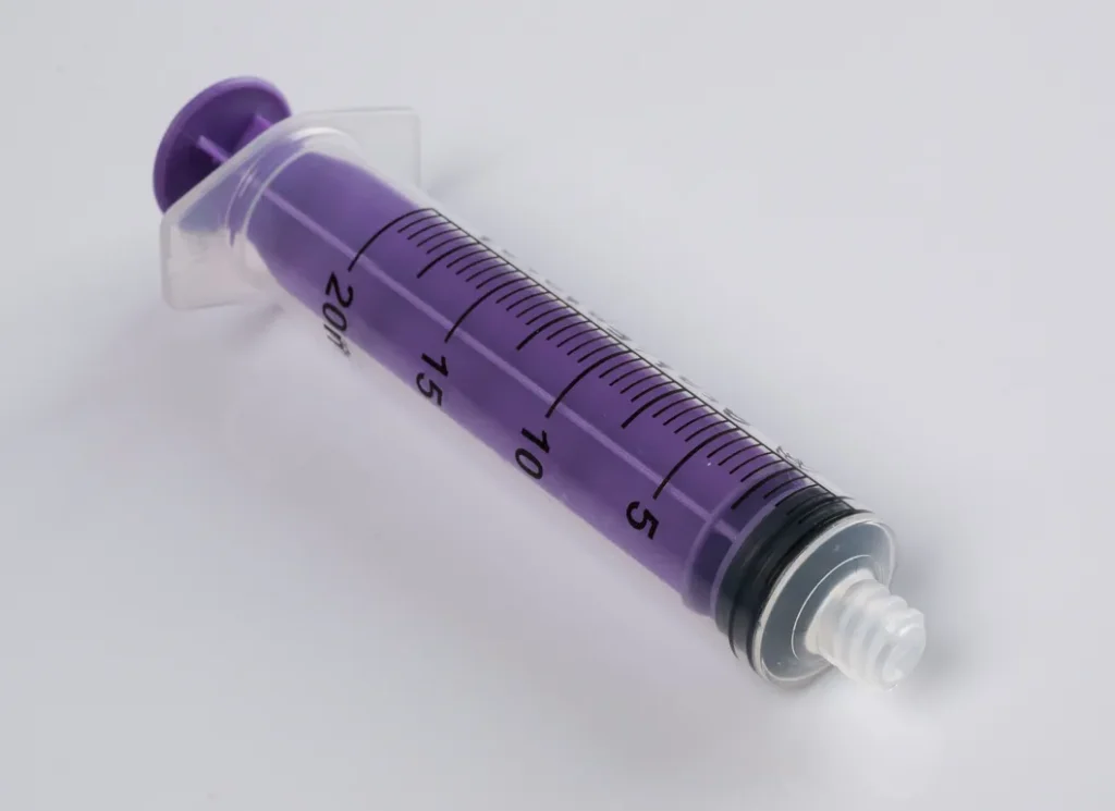 ENFit Enteral Syringe - Angled Product View Showing Thumb Control Ring Design