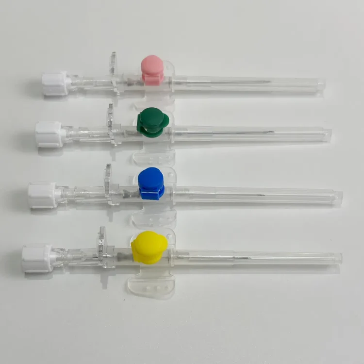 Safety IV cannula shown in multiple angles with winged grips and injection port design