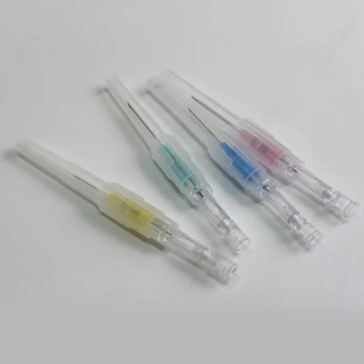 Top view of assorted color-coded safety pen needles in pink, yellow, green, and blue from pen needles manufacturer