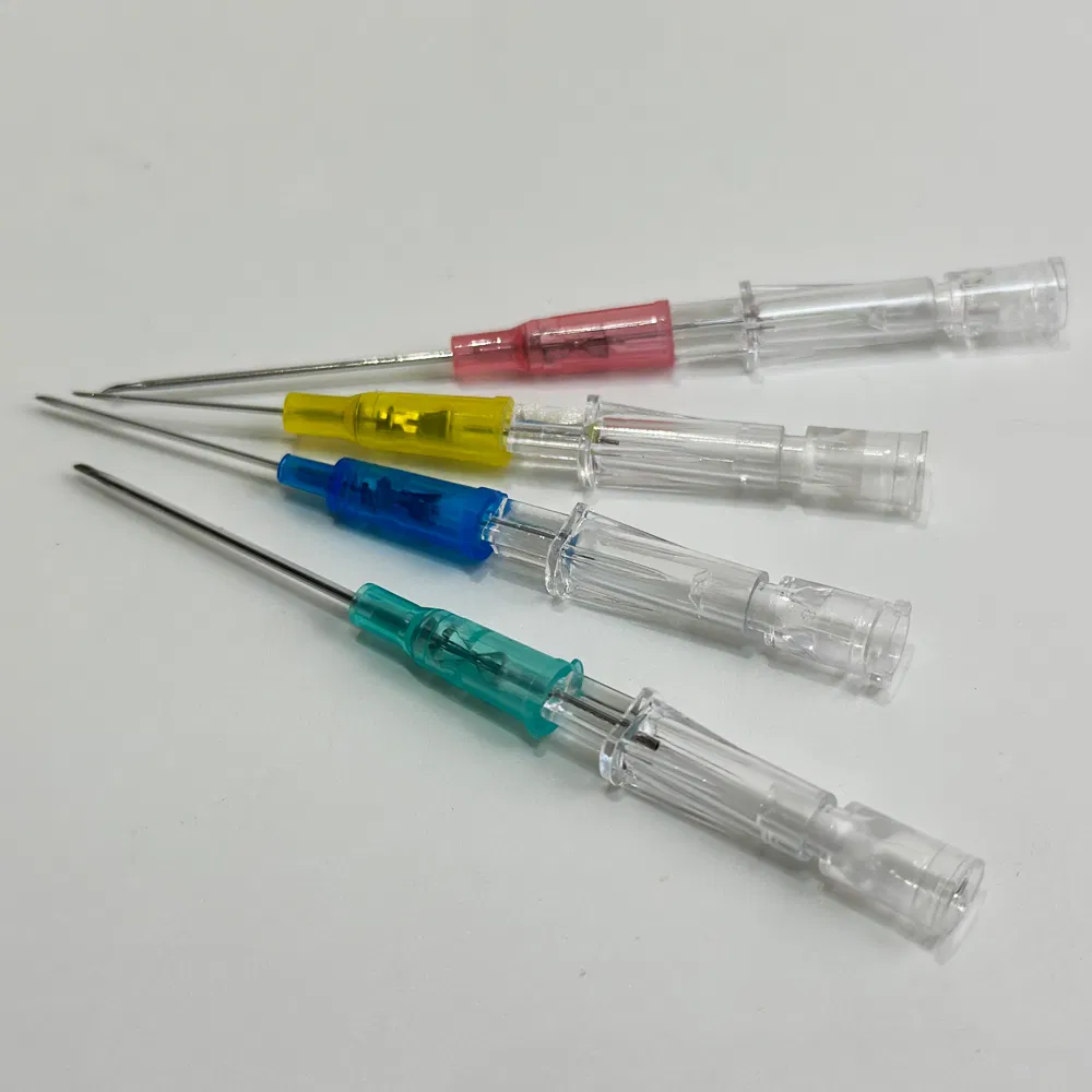 Detailed closeup of winged safety cannula in four colors showing ultra-sharp tri-beveled needle tips