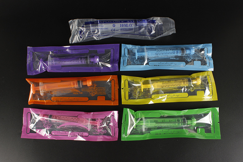 Assorted color pet feeding syringes 5-10ml in bulk packaging for veterinary clinics and animal hospitals