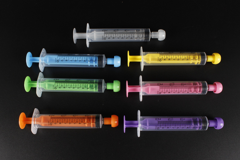 Medical grade plastic veterinary feeding syringes in multiple sizes and colors for professional animal care