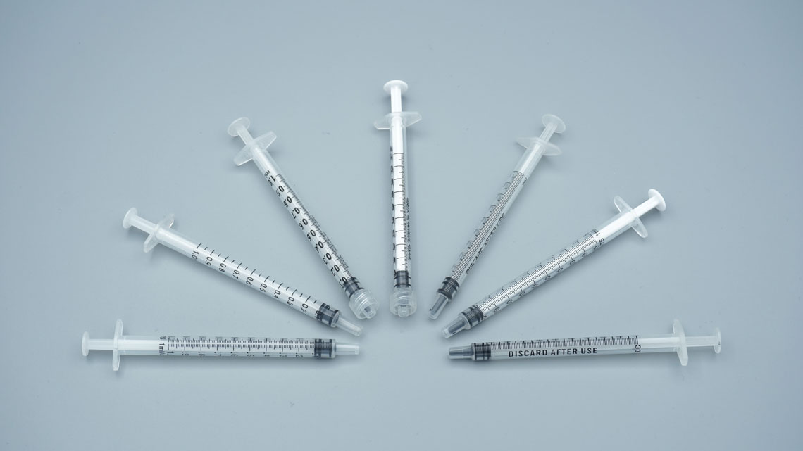Top view of bulk set of 1ml no needle individually wrapped sterile syringes