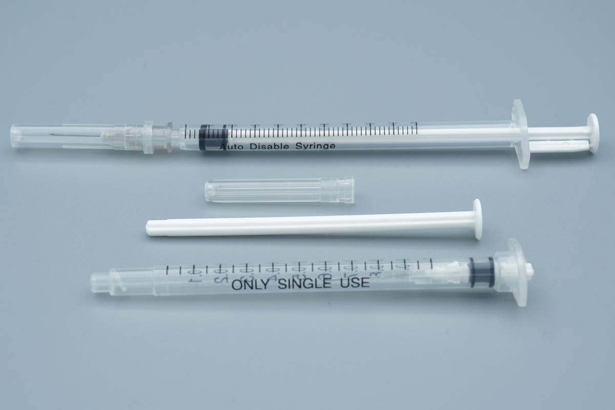 Break-off plunger detail on retractable safety syringe Break-off plunger detail on retractable safety syringe