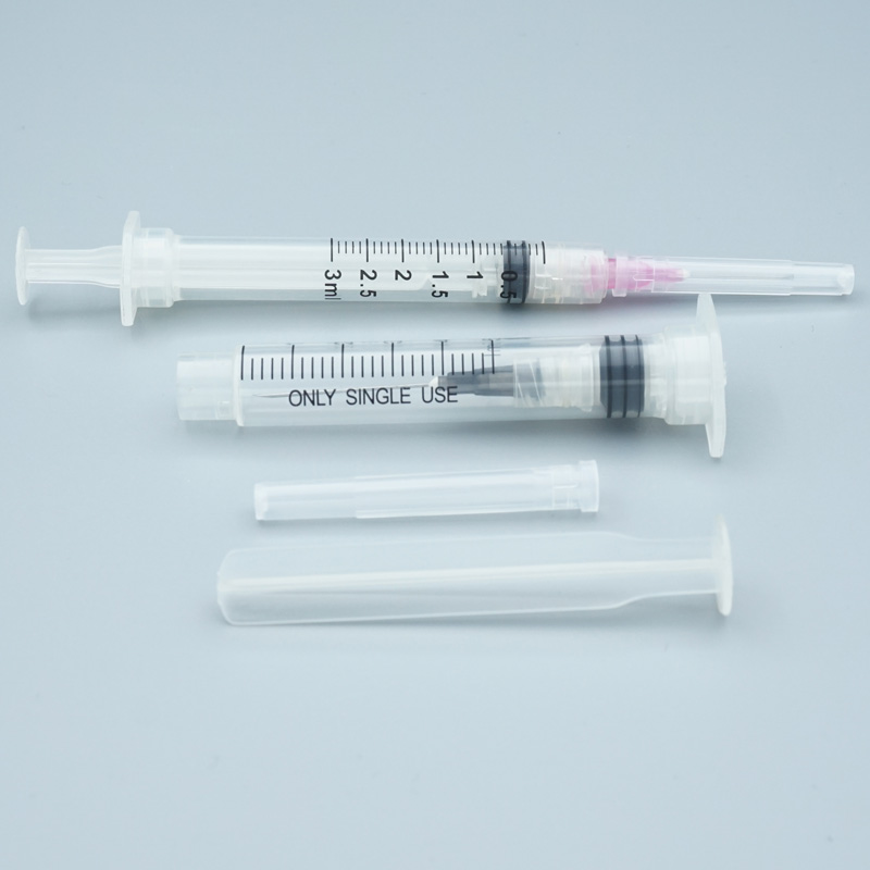 Retractable Safety Syringe - Luer Lock Retractable Needle Safety Syringes Luer lock retractable syringe - packaging and product set