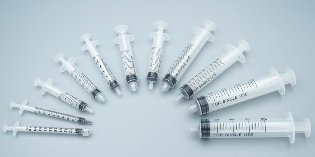 Medical syringes size comparison lineup for hospital use